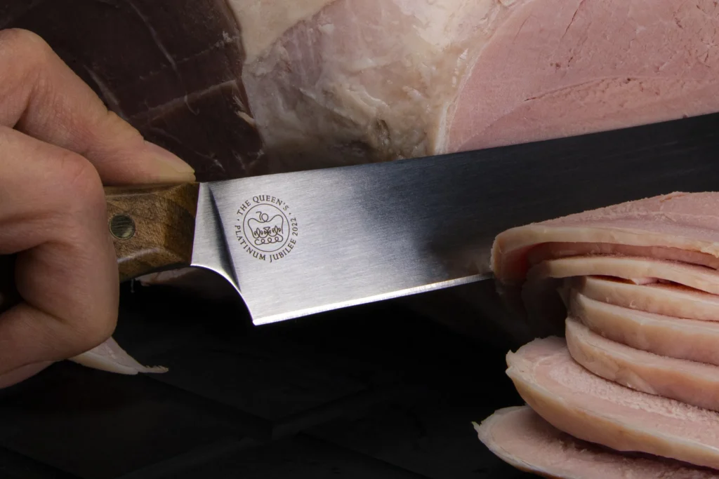 Commemorative carving knife and fork in English walnut with Jubilee engraving