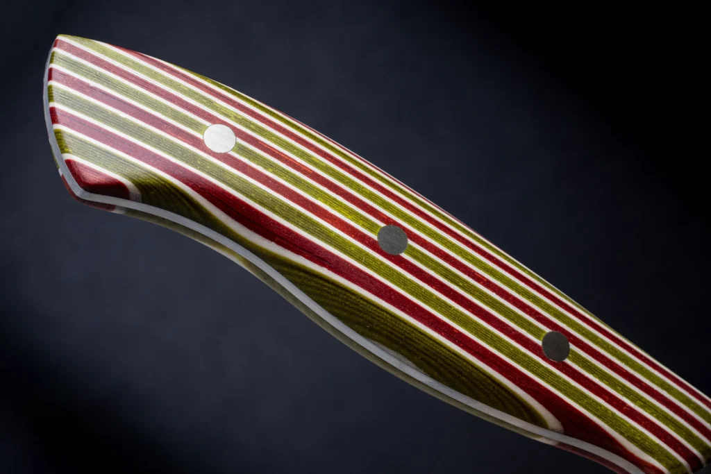 Compressed paper handle showing layered bands of colour, GF Smith collaboration