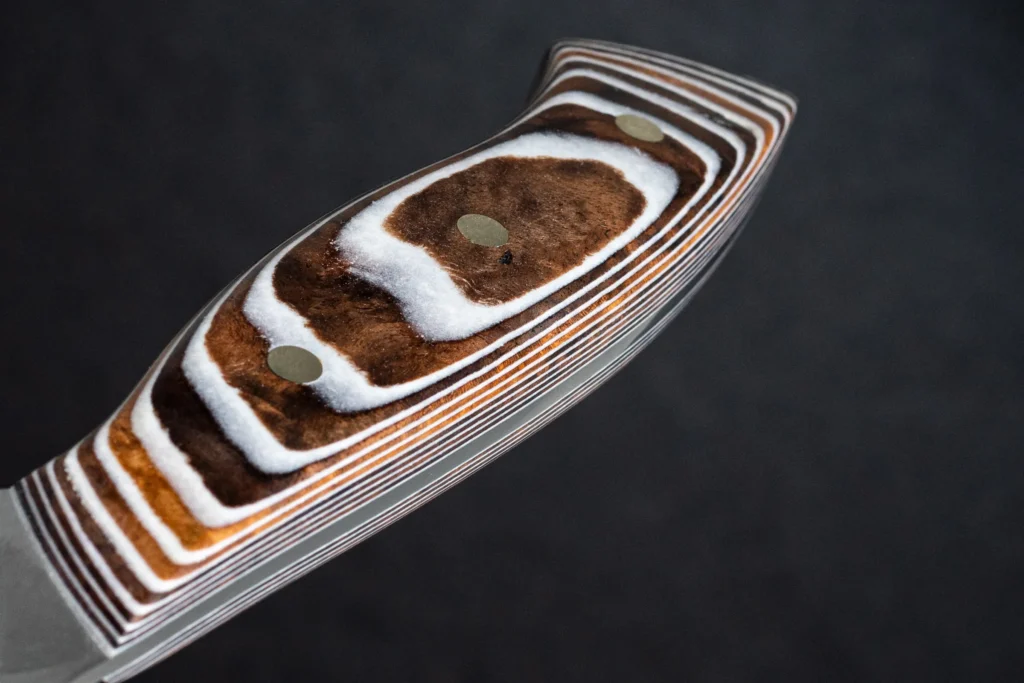 Sideways paper pattern with layers running at ninety degrees to the blade