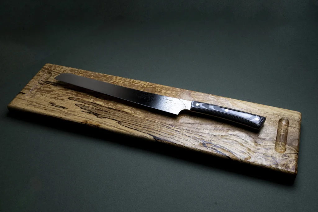Salmon slicer with a very thin blade for taking translucent slices
