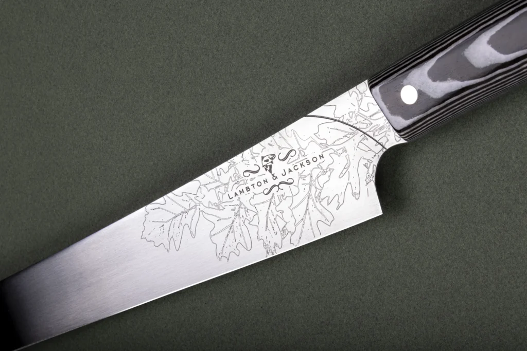 Long, slender salmon slicer engraved down its length, Lambton & Jackson collaboration