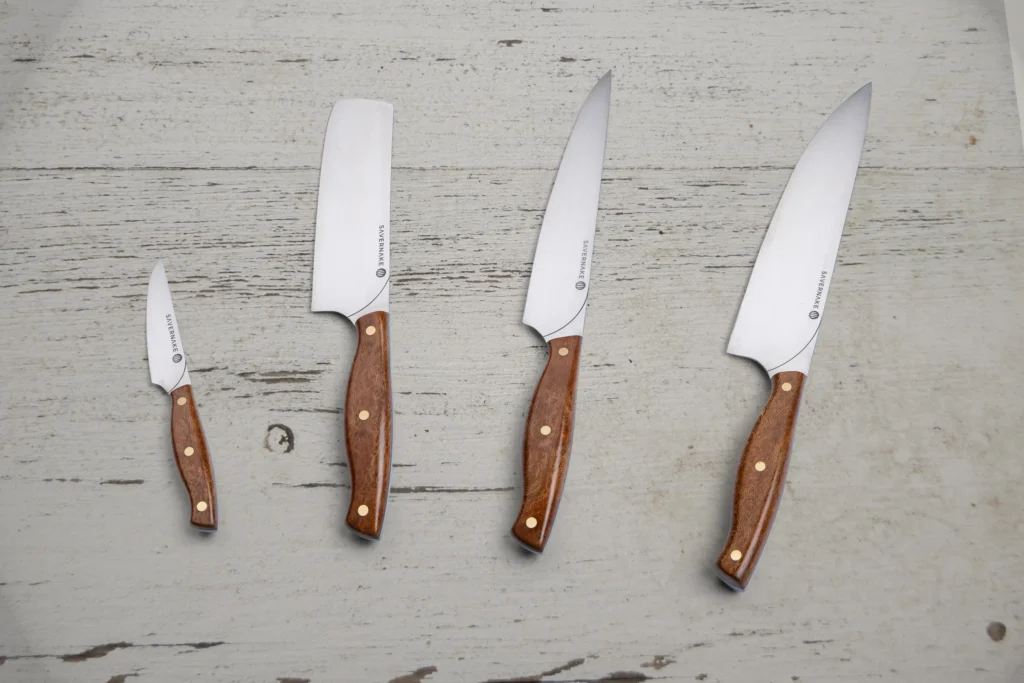 Quo Vadis centenary knife set handled in London plane from Soho Square